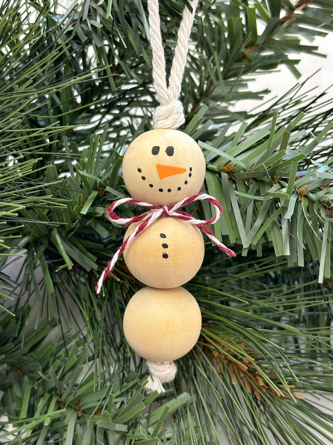 Woodbead Snowmen Ornament